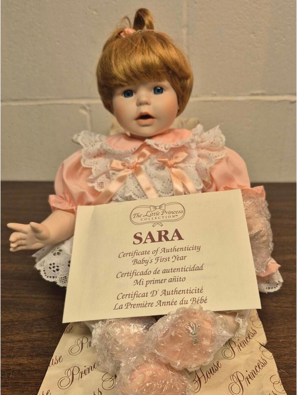 Sara Porcelain Baby Doll with Certificate of Authenticity